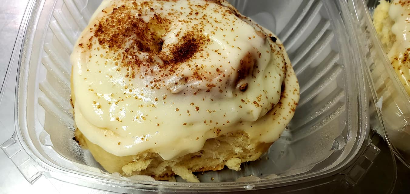 Delicious cake slice with creamy frosting layers